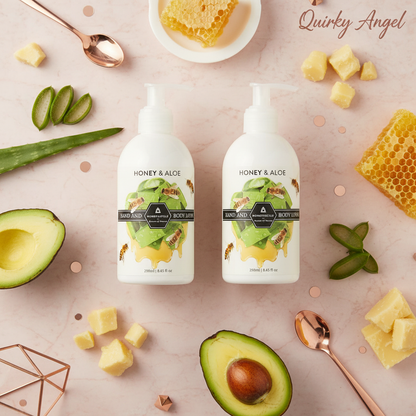Honeysuckle Honey & Aloe Body Lotion flat lay with two bottles and botanicals