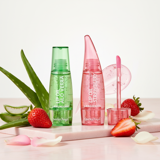 Aloe Vera and Strawberry Lip Oil Set on pink marble with natural ingredients