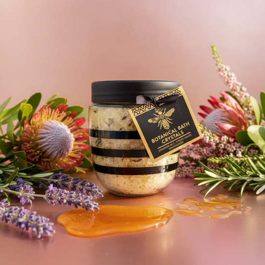 Honeysuckle Botanical Bath Crystals hero shot with lavender and fynbos flowers