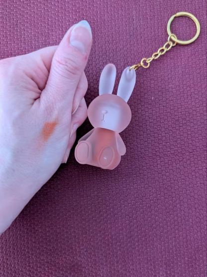 Bunny lip gloss keychain detail shot with gold ring