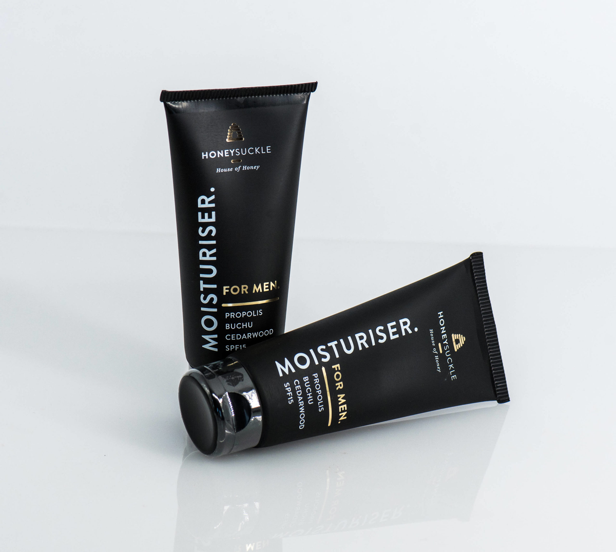 Two Honeysuckle Moisturiser For Men SPF15 100ml tubes on a white background