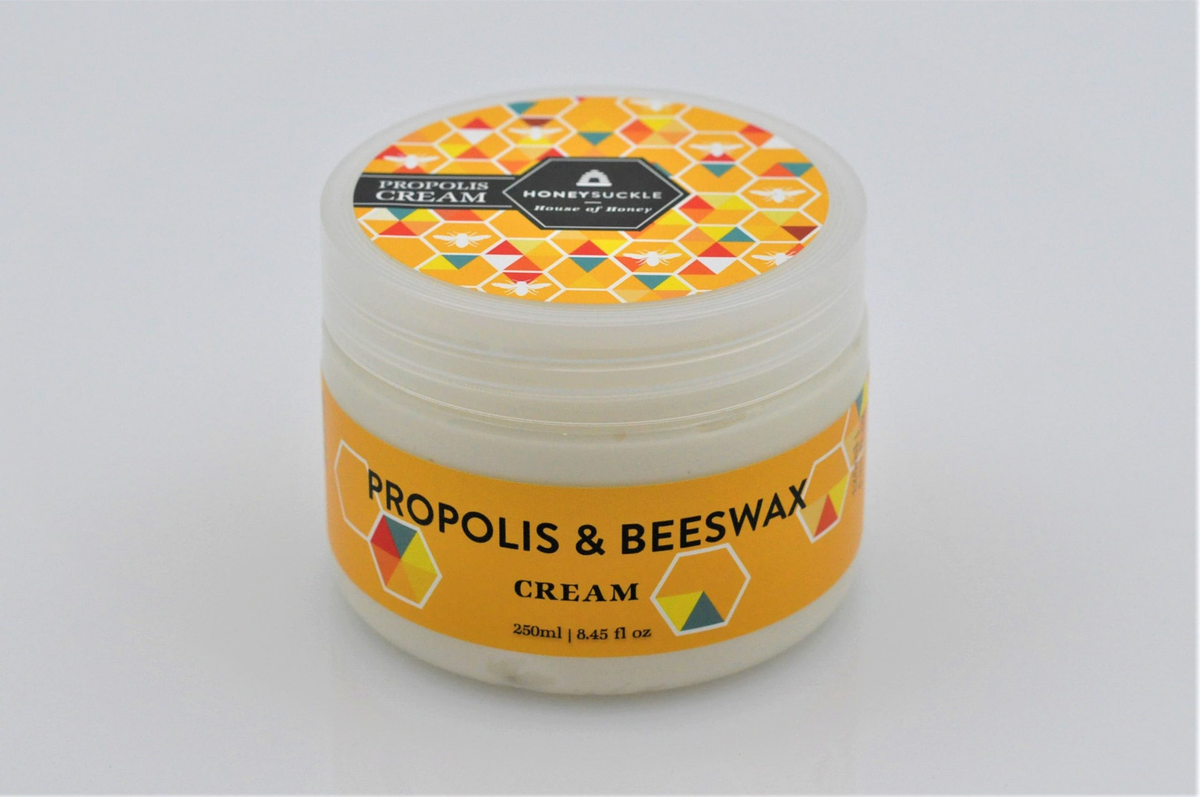 Honeysuckle Propolis & Beeswax Cream 250ml tub with golden honeycomb geometric label
