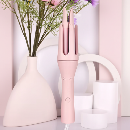 Pink 32mm automatic rotating curling iron with forked curling chamber and ergonomic handle